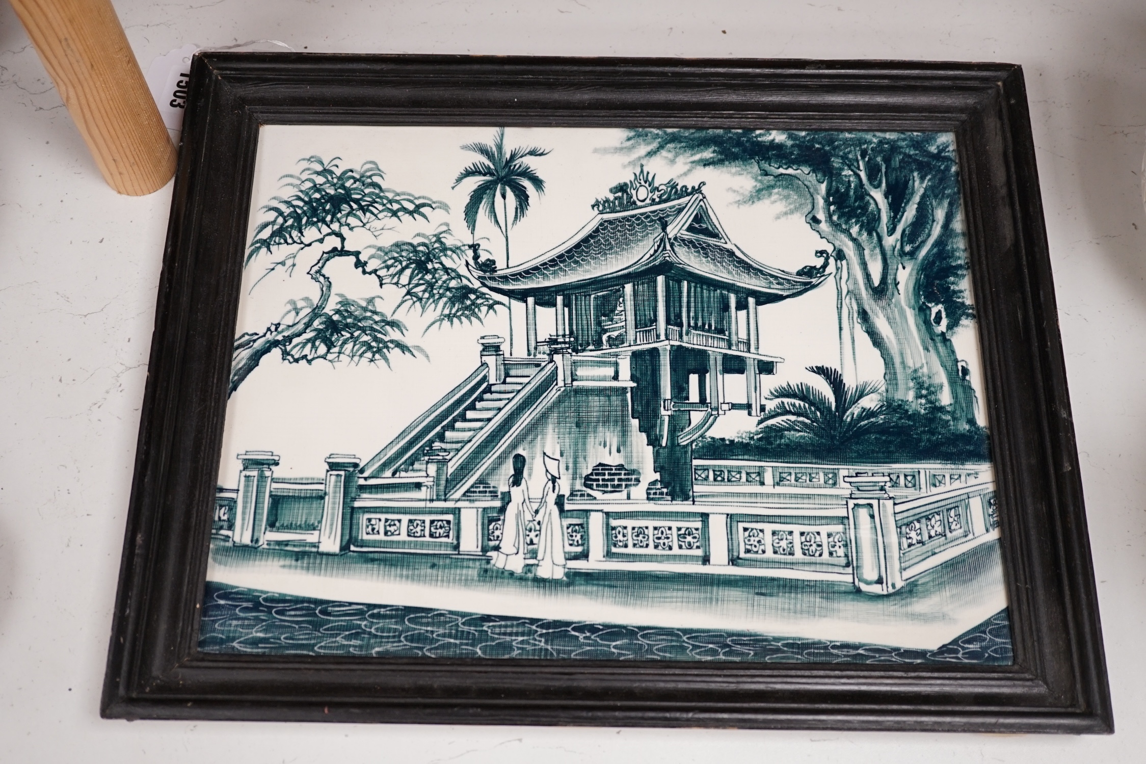 A late 20th century South East Asian plaque, framed, overall 36 x 45cm. Condition - good other than some knocks to frame